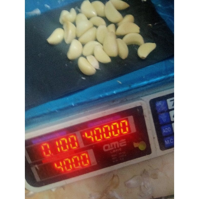 

100gram dan/atau paket 5000 rupiah Bawang Putih Kupas(BPK)