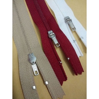 resleting ykk kepala besi (lusinan)