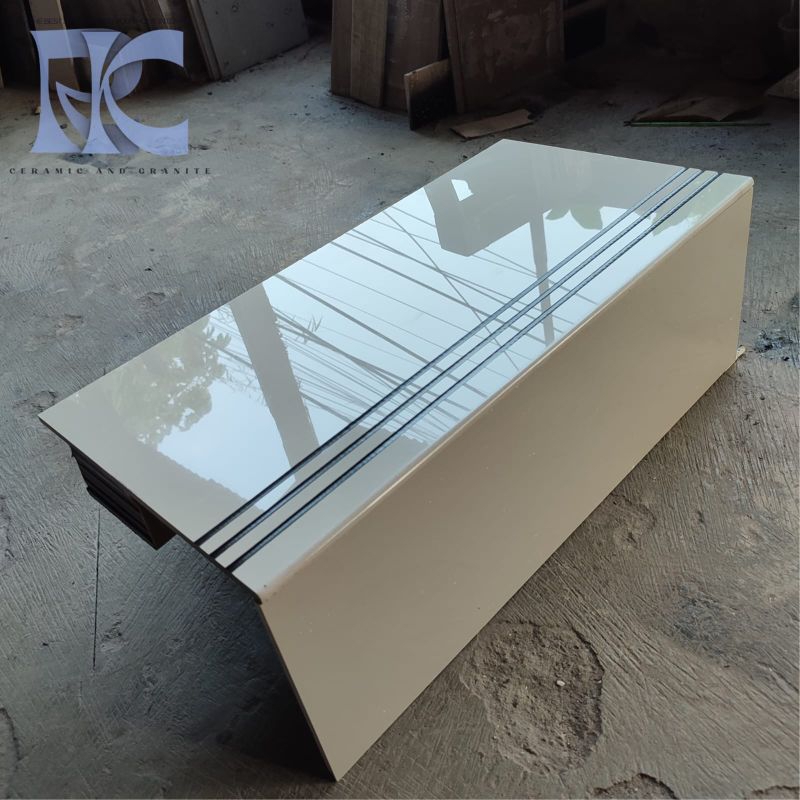 Pijakan granit anak tangga 30x80 Cream polos nosing hitam