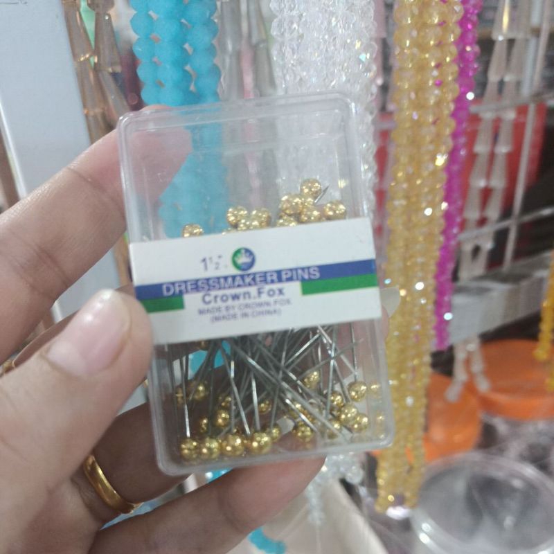 jarum pentul emas