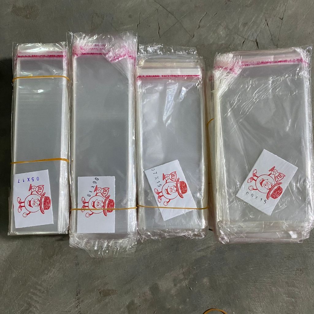 [GB] PLASTIK OPP LEM /PLASTIK OPP SENDOK GARPU/PLASTIK UANG TEBAL 0.3MM ISI 100 LEMBAR INV2