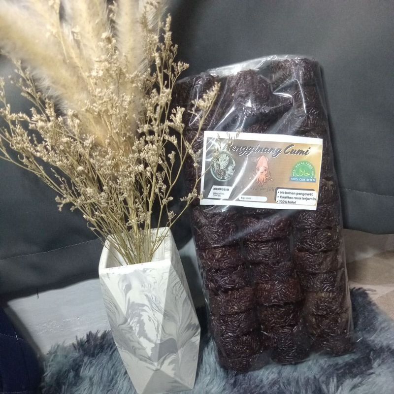 

RENGGINANG CUMI HITAM KEMASAN 250GR,480GR,500GR KHAS MADURA