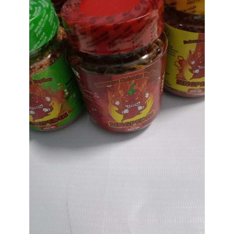 

Sambal paru merk "SINGPEDES"kemasan toples 200ml,halal,pedas,gurih