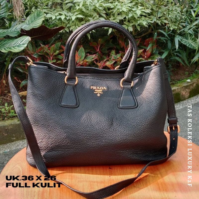 TAS wanita preloved branded Prada*, kulit asli lentur balik zip lempo limited edition