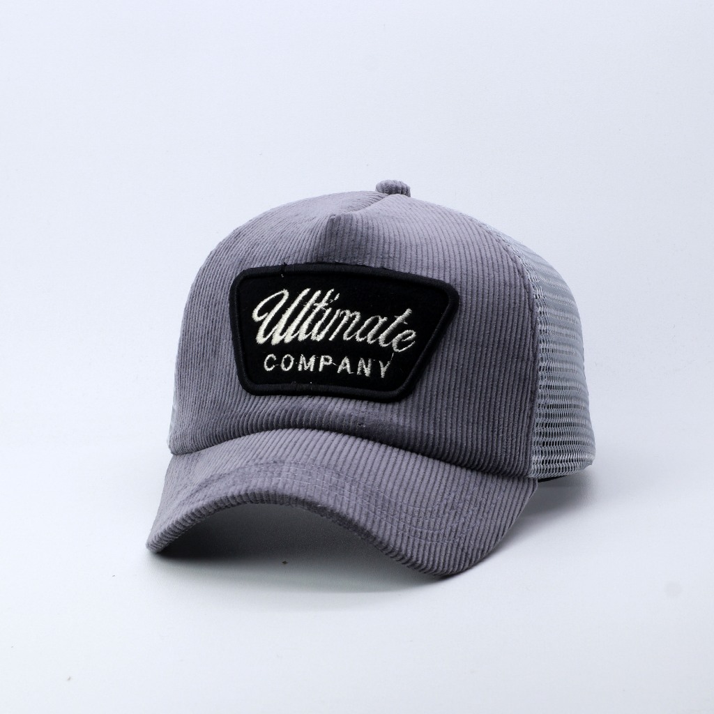 TOPI JARING TRUCKER HAT LIDAH PENDEK BAHAN CORDUROY WARNA ABU VISOR PENDEK ULTIMATE COMPANY