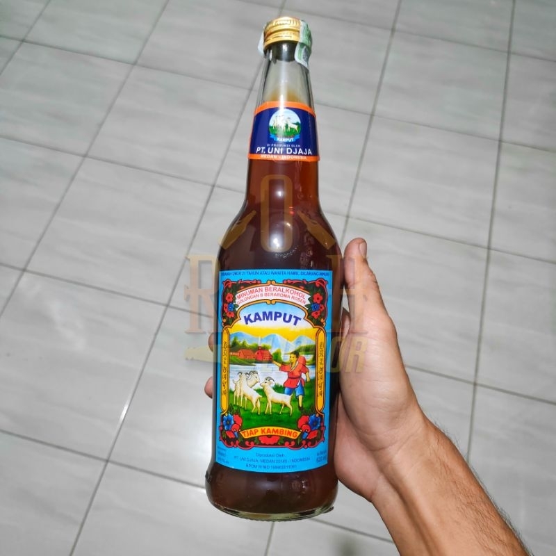 

EKSTRAK BUAH PEPAYA KEMASAN BOTOL KACA TJAP KMPT