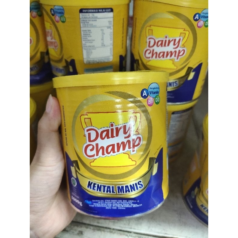 

DAIRY CHAMP KRIMER KENTAL MANIS PUTIH KALENG 1 KG