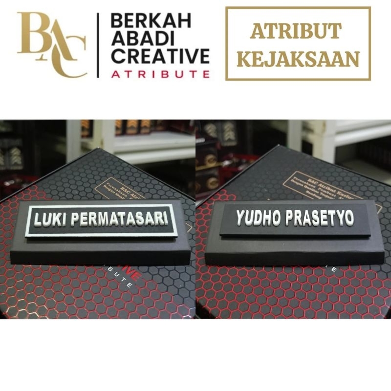 

BAC ATRIBUT KEJAKSAAN - NAMETAG PAPAN NAMA EXCLUSIVE TIMBUL BAC ATRIBUT