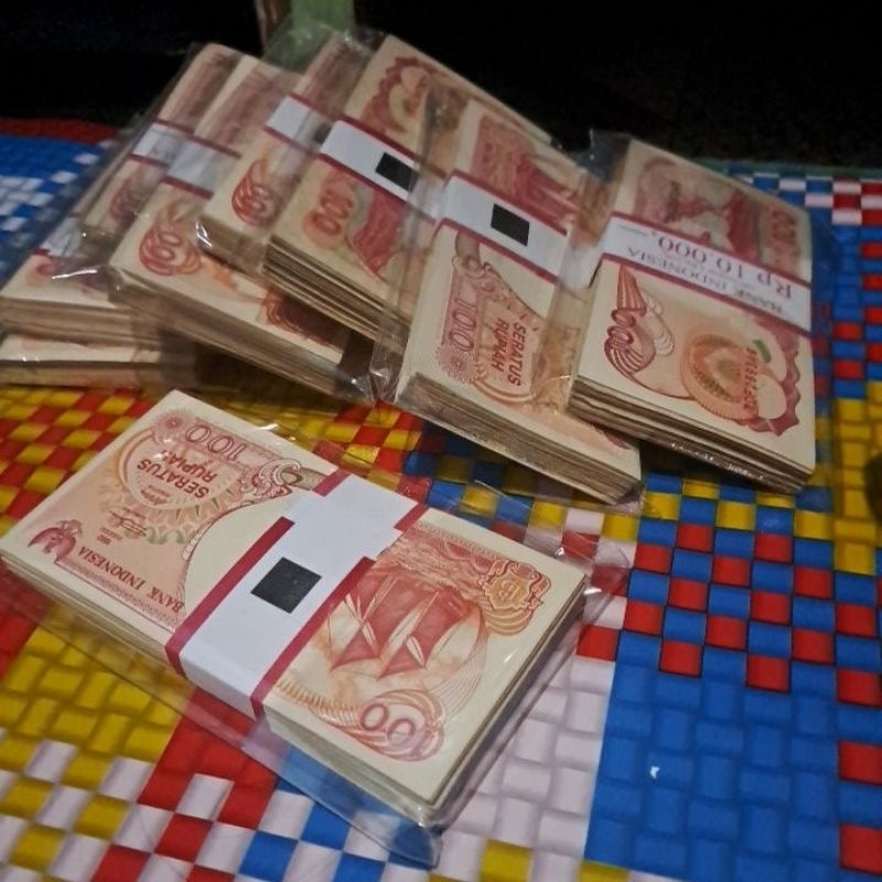 satu lak (100 lembar) uang 100 penisi 1992 mulus acak