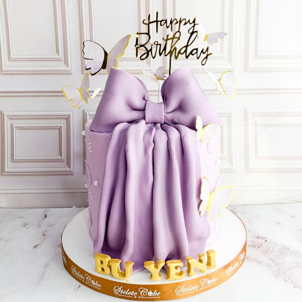 

Kue Ulang Tahun/Birthday Cake/Kue Ultah Tema Pita/Kue Pita Ungu/Kue Birthday Jakarta