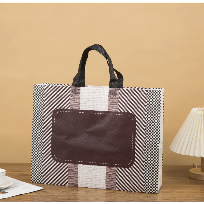 

Tas Jinjing / Tas Belanja / Tas Spunbond / Tas Souvenir / Tas Jinjing Wanita / Tas Lipat / Tas Kado / Kantong Belanja Ukuran 32 x 10 x 27