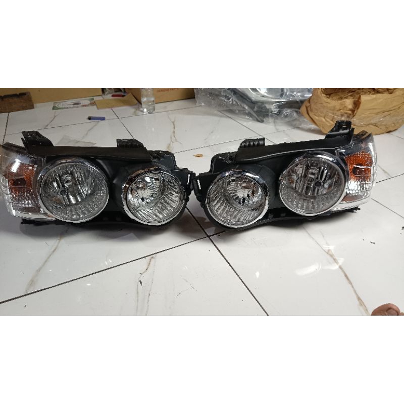 lampu depan headlamp aveo sonic lis crom
