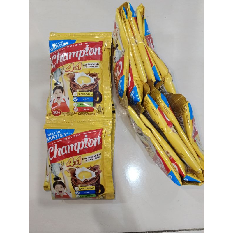 

susu champions sachet 1 renceng Free 1pcs