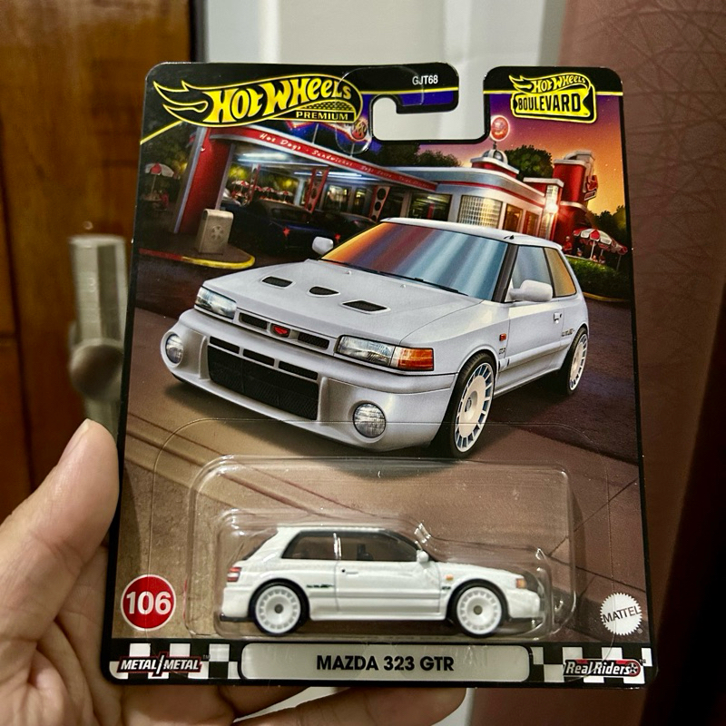 Hot Wheels Premium Boulevard - Mazda 323 GTR Putih White