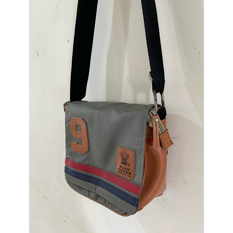 Tas Selempang Blue Cross