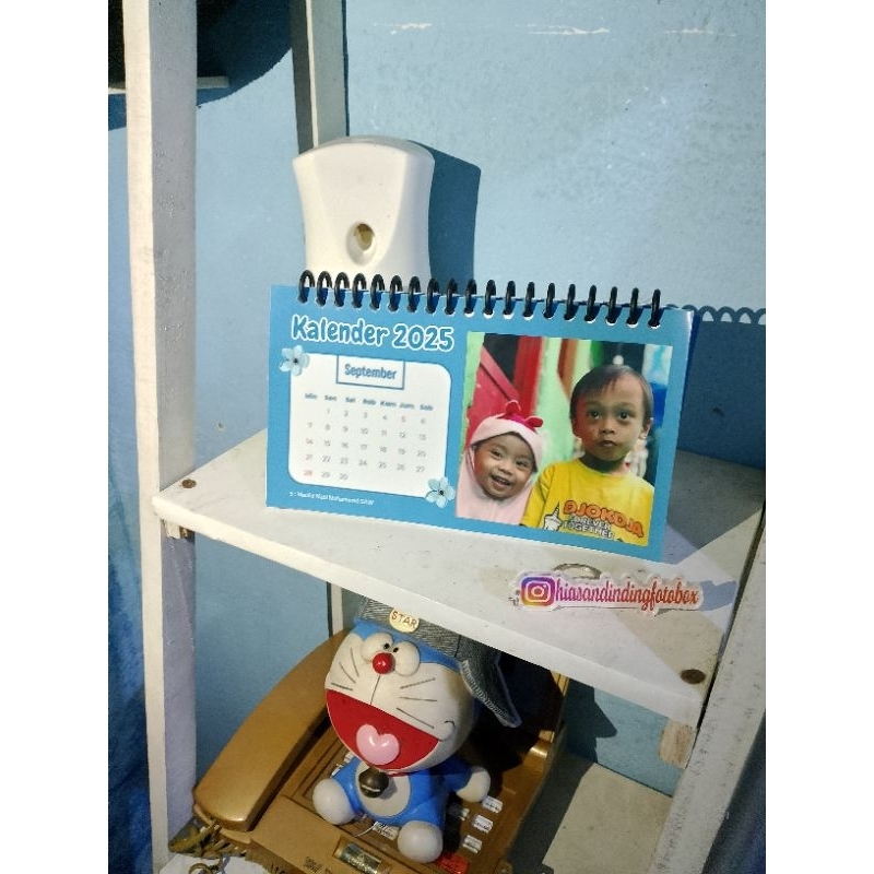 

Kalender Meja costum foto