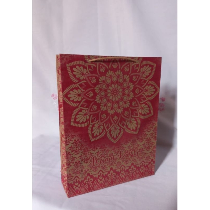 

(ISI 50 PCS)PAPER BAG UKURAN TANGGUNG MOTIF MATAHARI