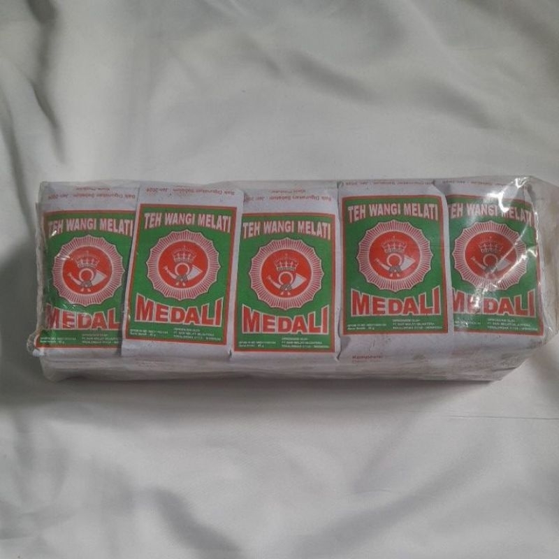 

Teh Medali Teh Wangi Melati 1 slop isi 10 pcs (10 × 50gr)