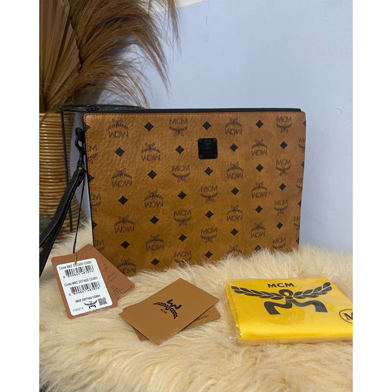MCM medium aren clutch cognac authentic