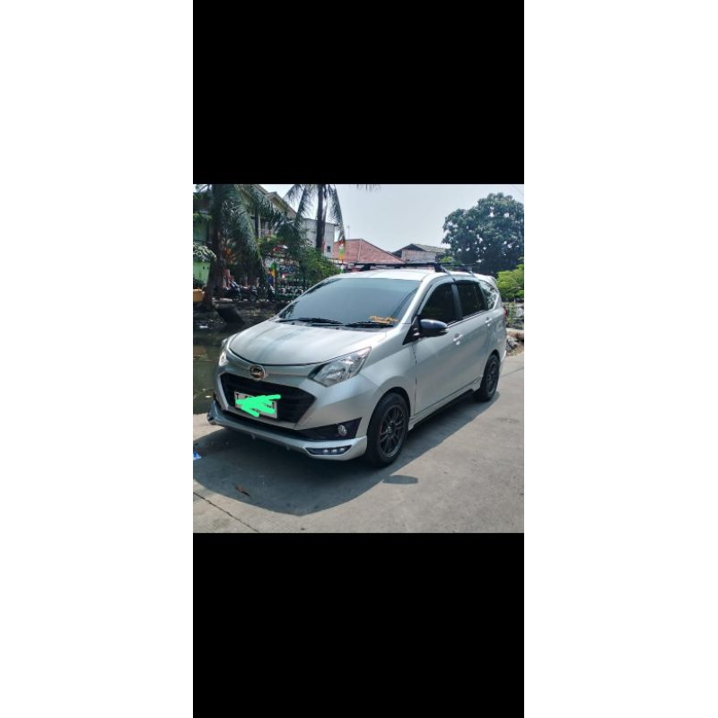bodykit Sigra samping depan
