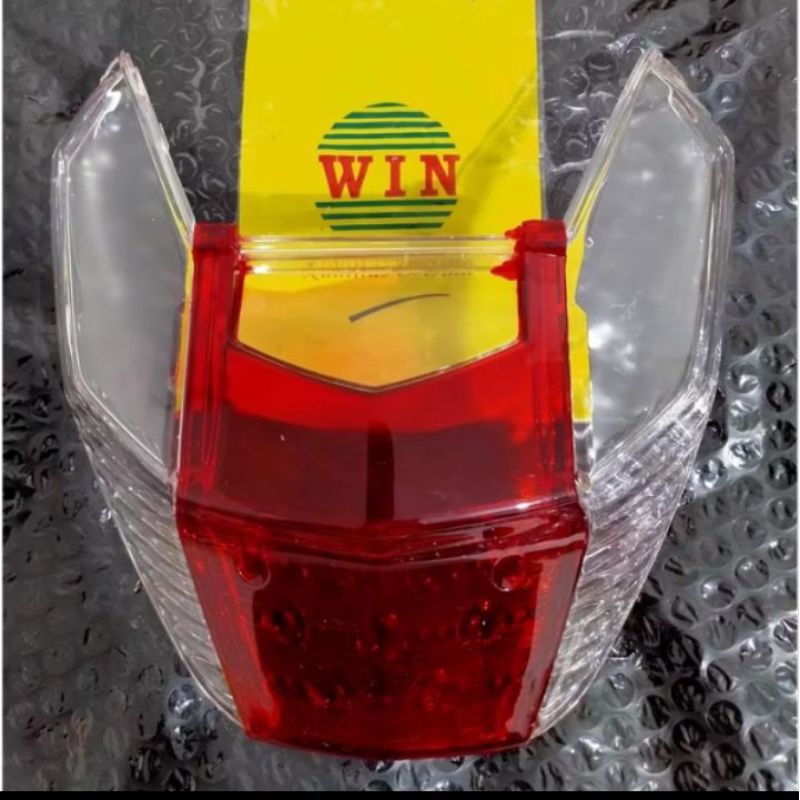 Mika Sein + Stop Lampu Supra X 125 Putih Merah