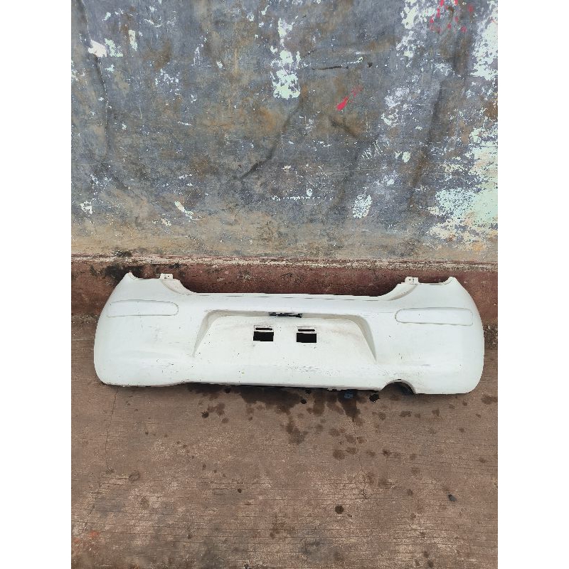 bemper belakang nissan march 2012