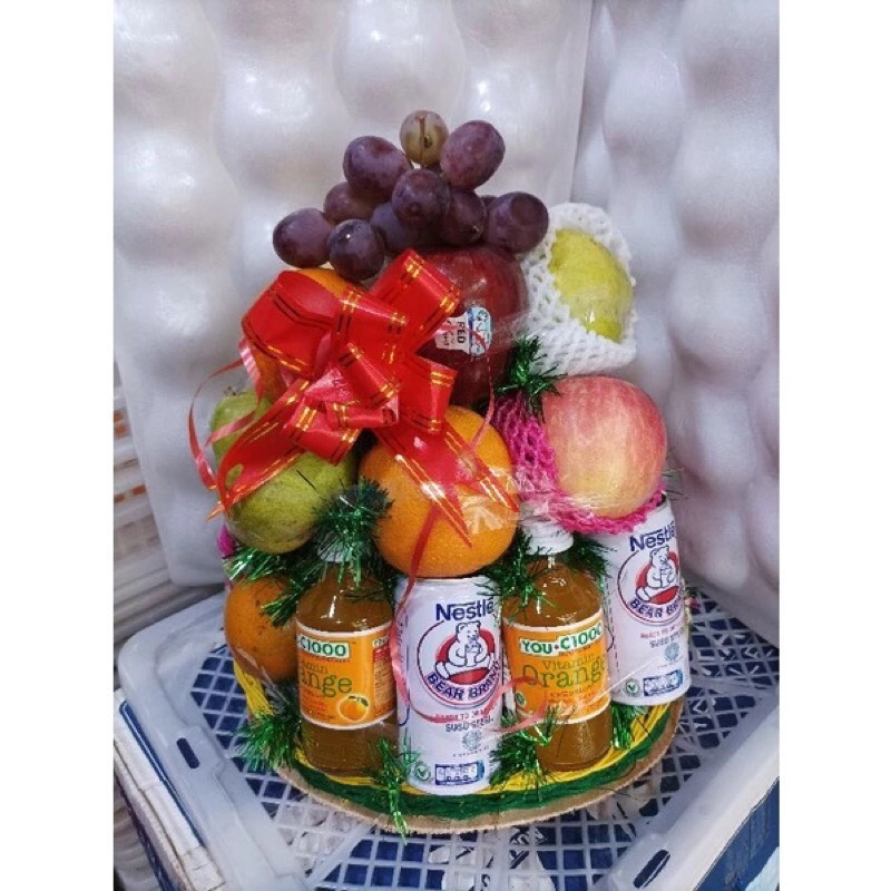 

parcel buah dengan minuman susu dan bervitamin