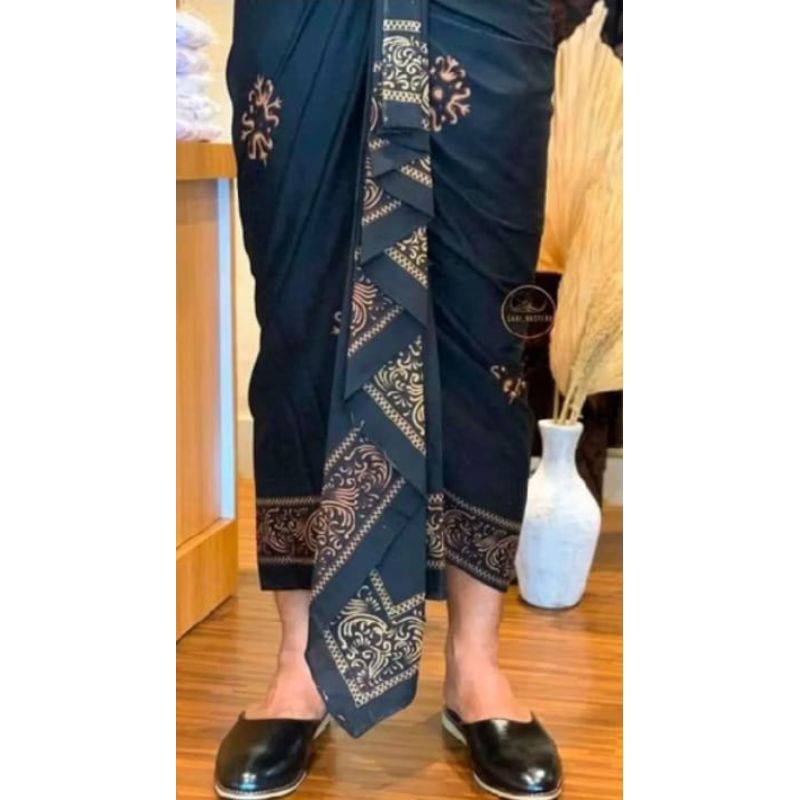 Kamen pria setengah jadi