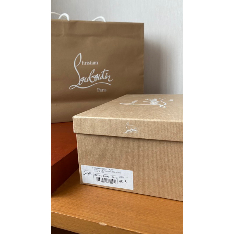 

Christian Lo*bution original box & paperbag