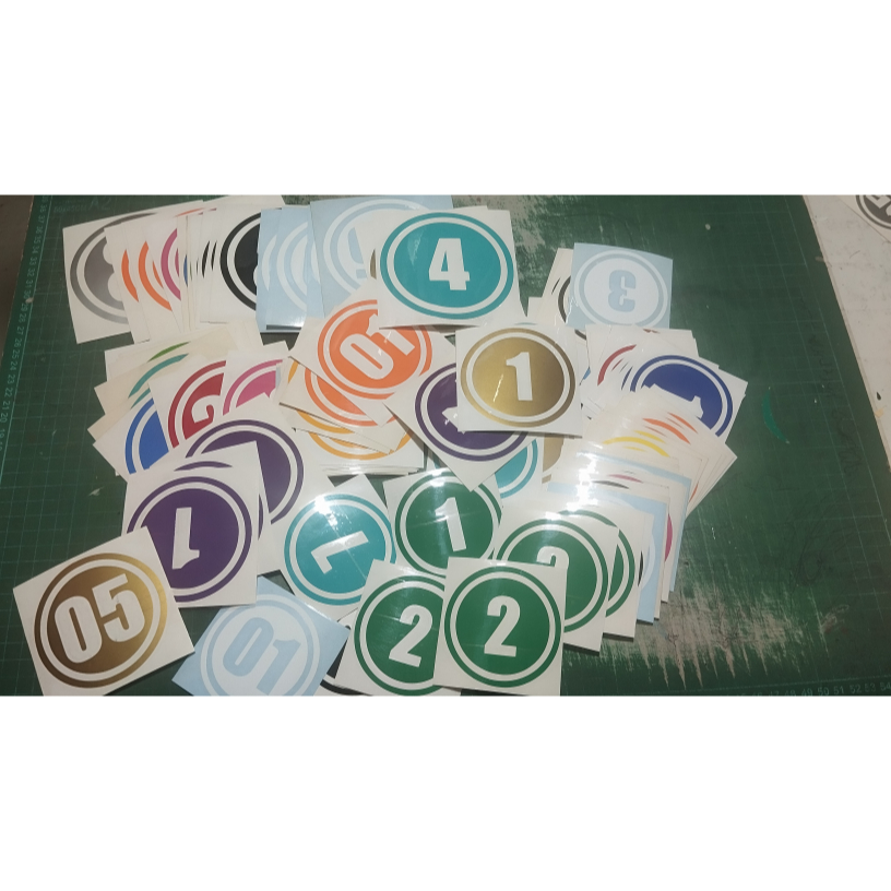 

STIKER CUTTING ANGKA BOLONG DLM LINGKARAN UK 5 CM BAHAN ORACAL