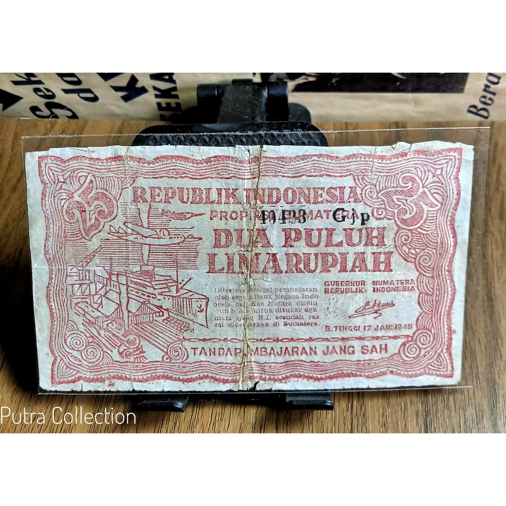 Uang 25 Rupiah Sumatra Bukit Tinggi ORIDA (V8)