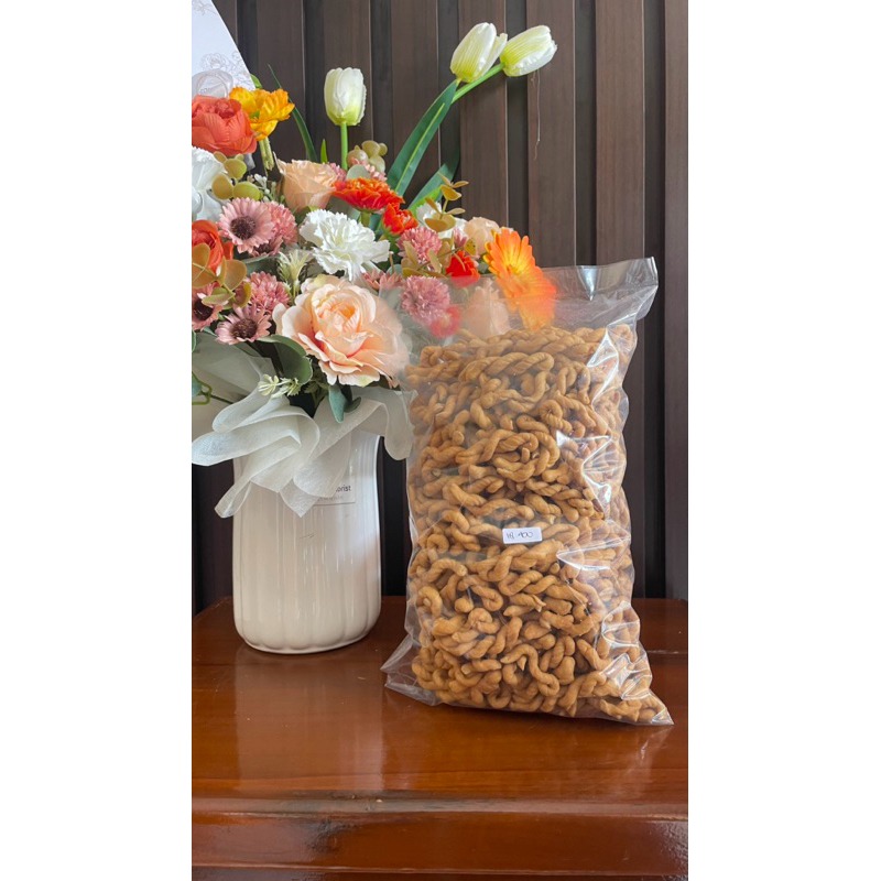 

Cemilan Pluntiran kemasan 500gr-1kg