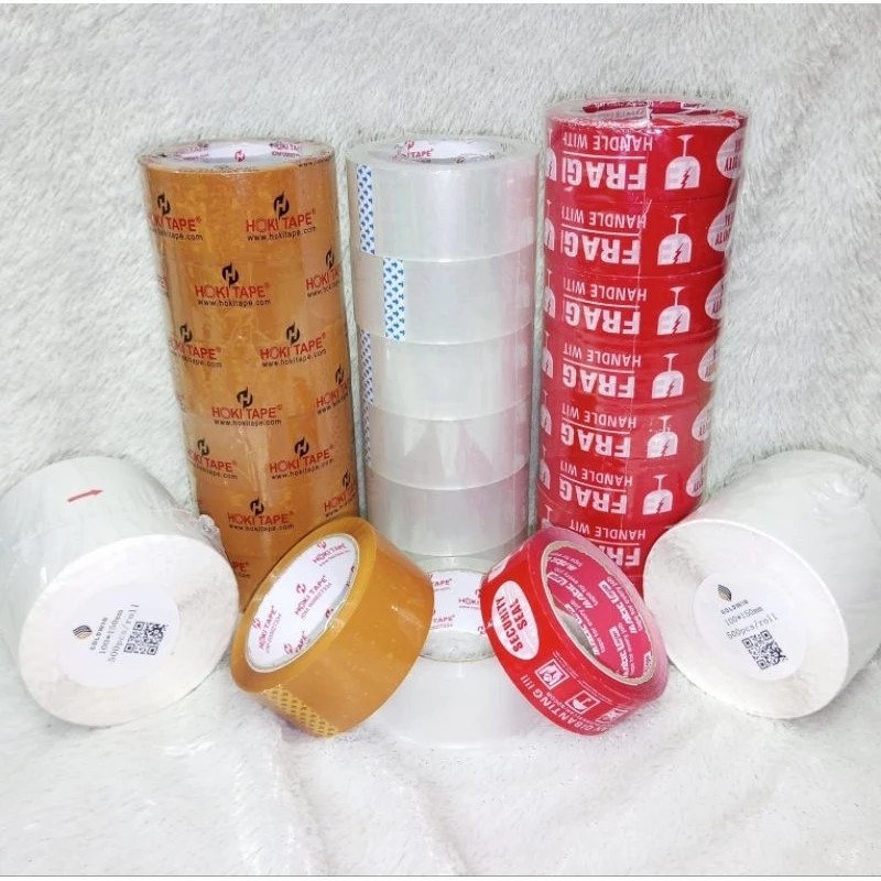 

Lakban bening dan coklat hoki tape ukuran asli 45×70m kelengketan 45mic (70mtr 80 yard) per 1 pcs