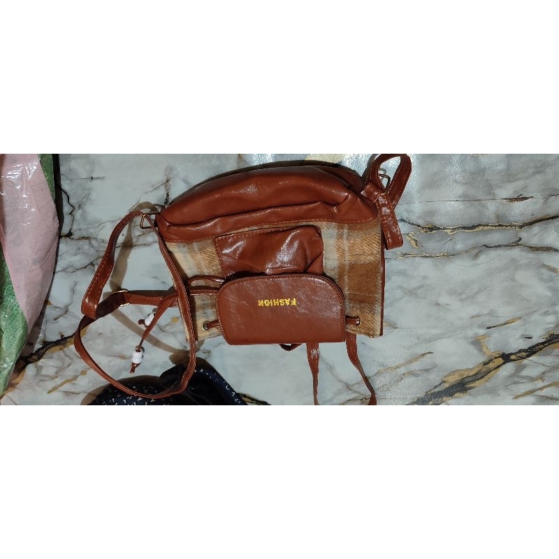 tas second makassar