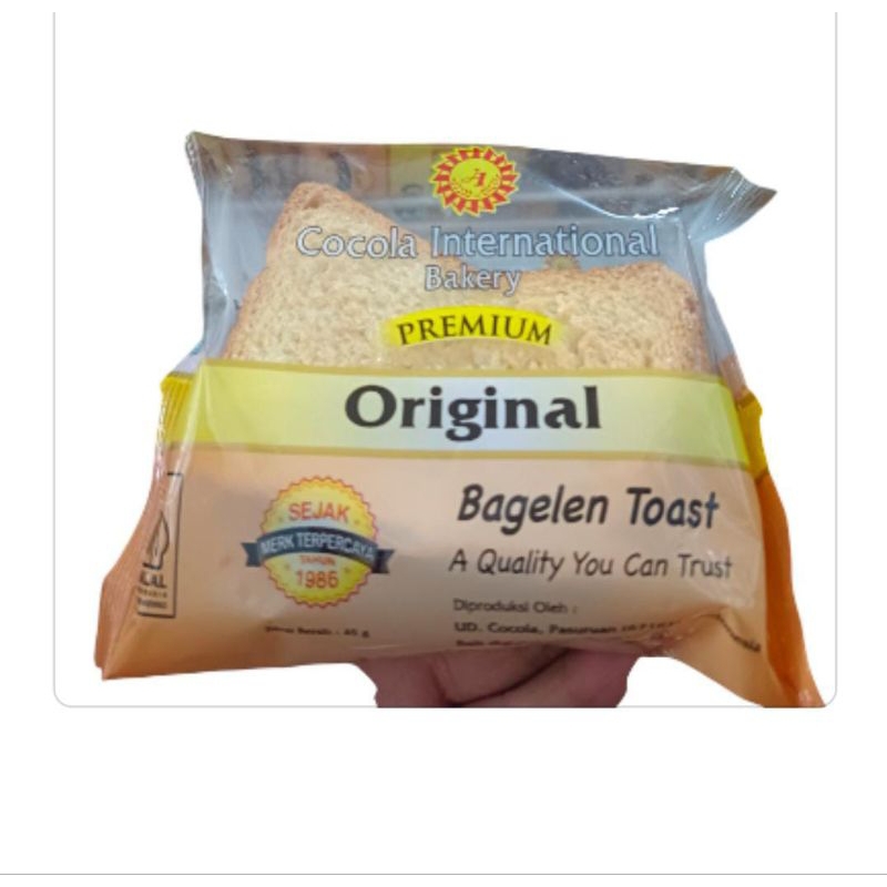 

Cocola international bakery premiun original bagelan toast roti kering