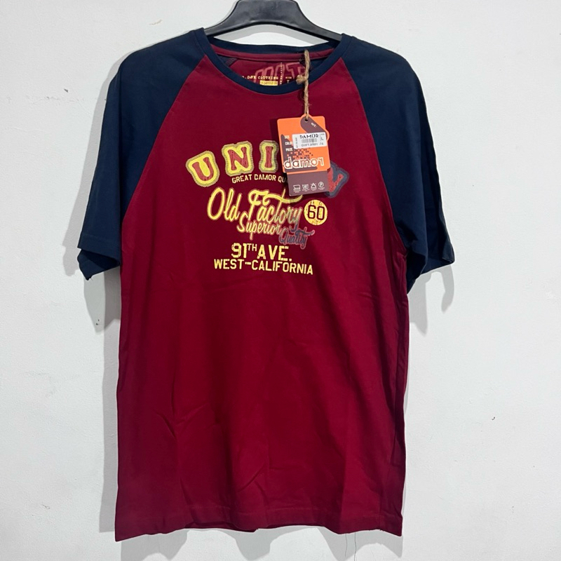 Kaos Merah Damor