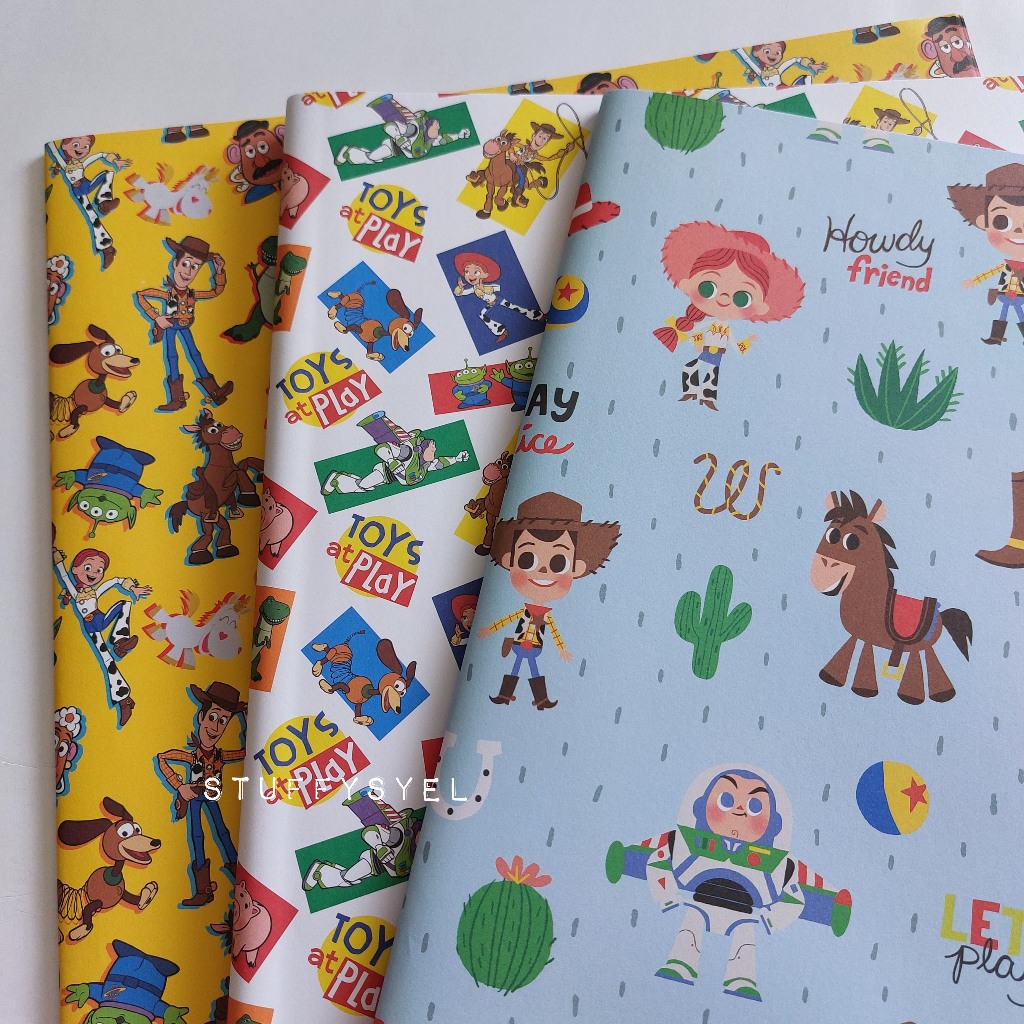 

kertas kado sansan wawa motif TOY STORY