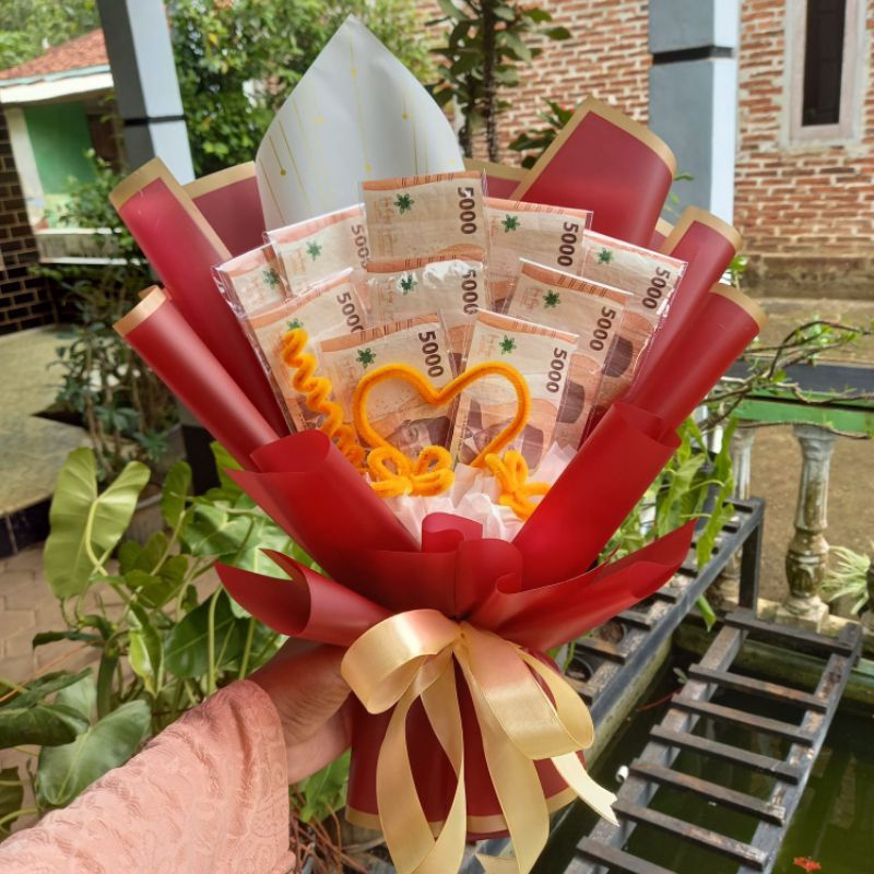 

Buket Uang 10 lembar tanpa bunga