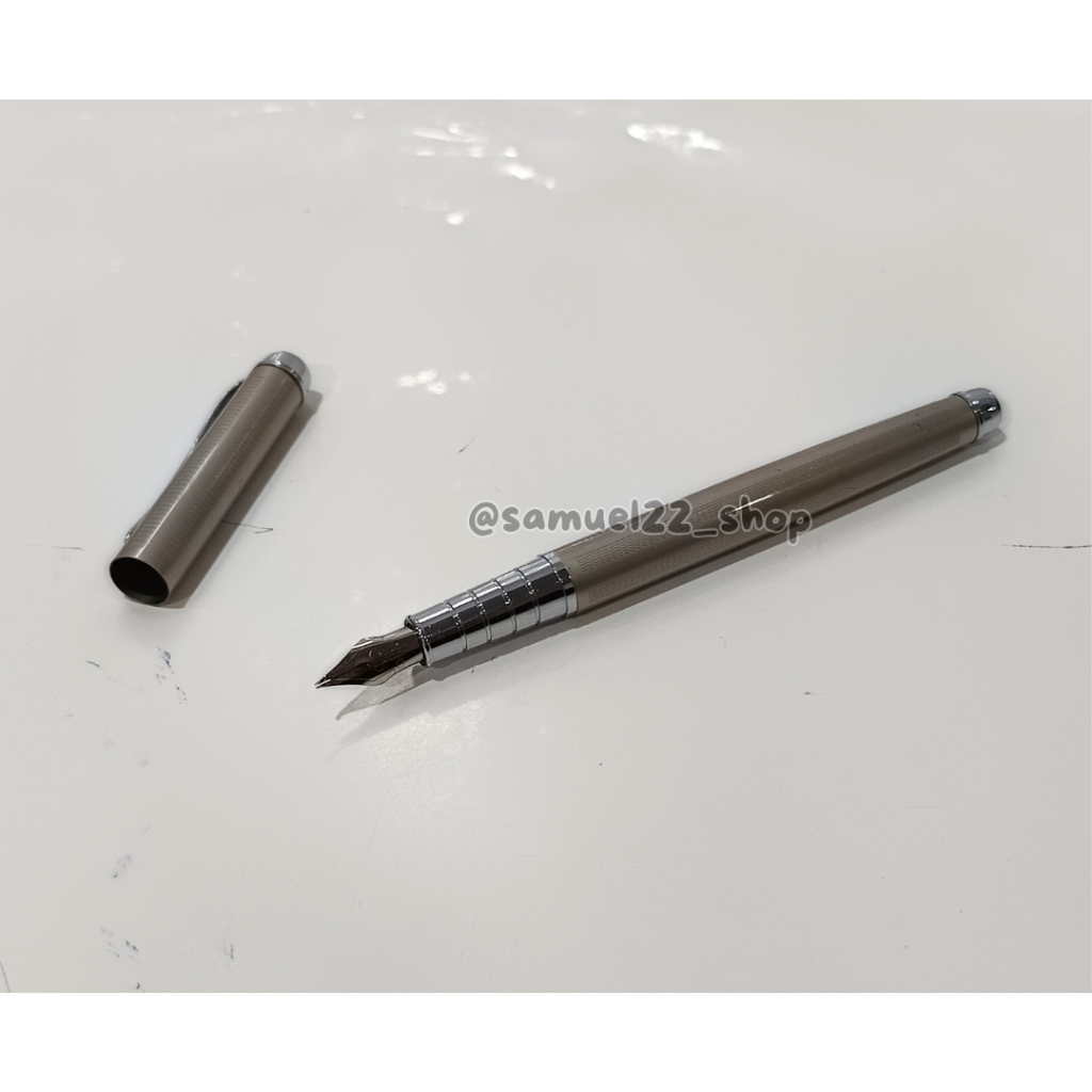 

Pulpen Fountain Papak Todak Silver 3064 Tinta Celup