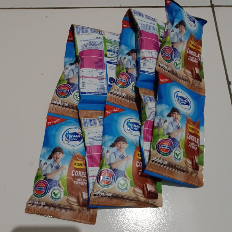 

susu kompleta cokelat milk powder frisian flag 35 gr isi 10 biji