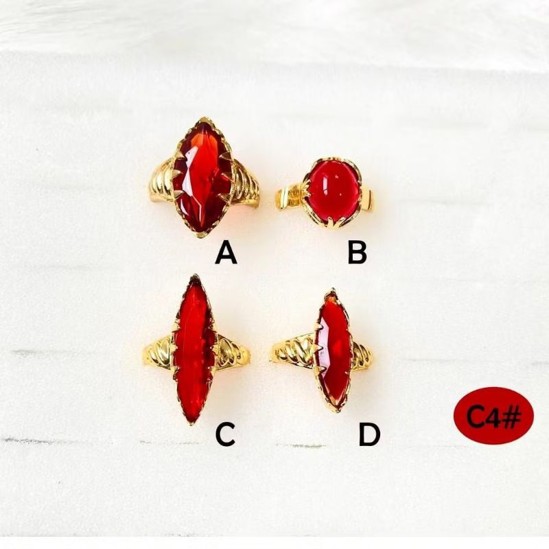 perhiasan cincin bahan koin permata merah delima terbaru