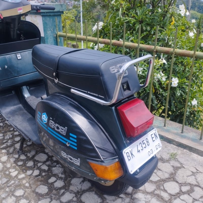 behel jok pegangan jok vespa excel lubang empat