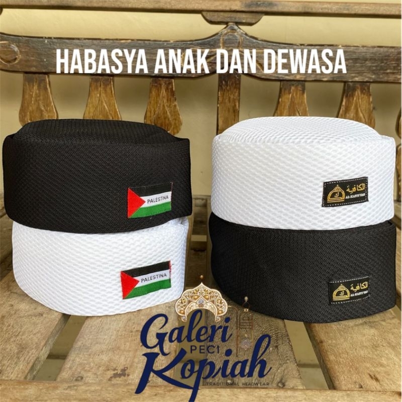 galeri PECI HABASYA BULAT ANAK LAKI LAKI DEWASA  POLOS HITAM PUTIH BAHAN PREMIUM