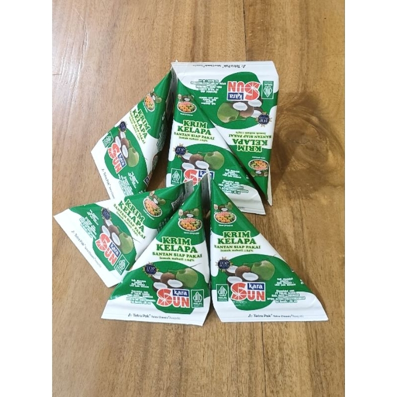 

Santan Sunkara Santan Kelapa Cair Sun Kara 65 ml kerucut PAKET HEMAT isi 6 pcs