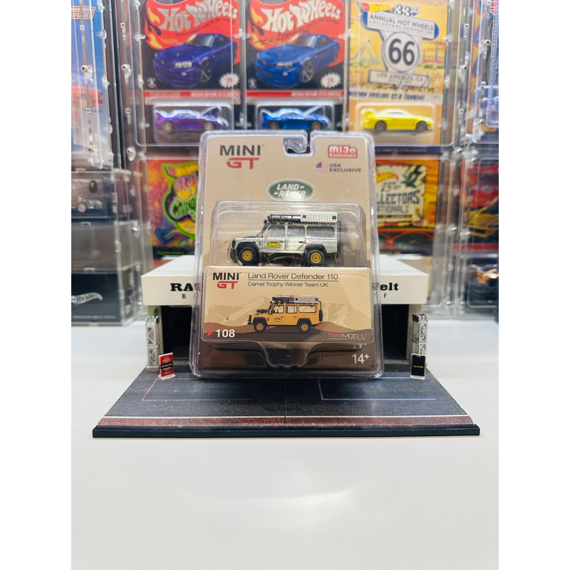 Mini GT CHASE No 108 Land Rover Defender 110 Camel Trophy Winner Team UK Mijo Exclusive