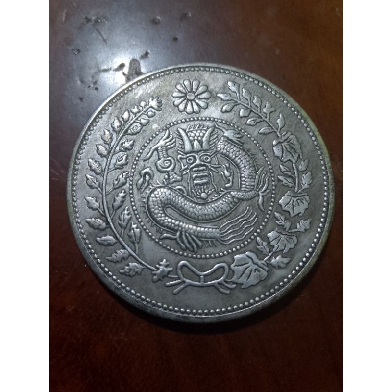 koin china naga padi dan kapas