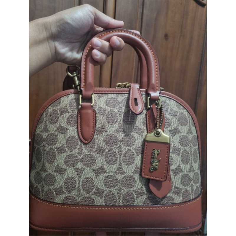 Preloved coach alma brown