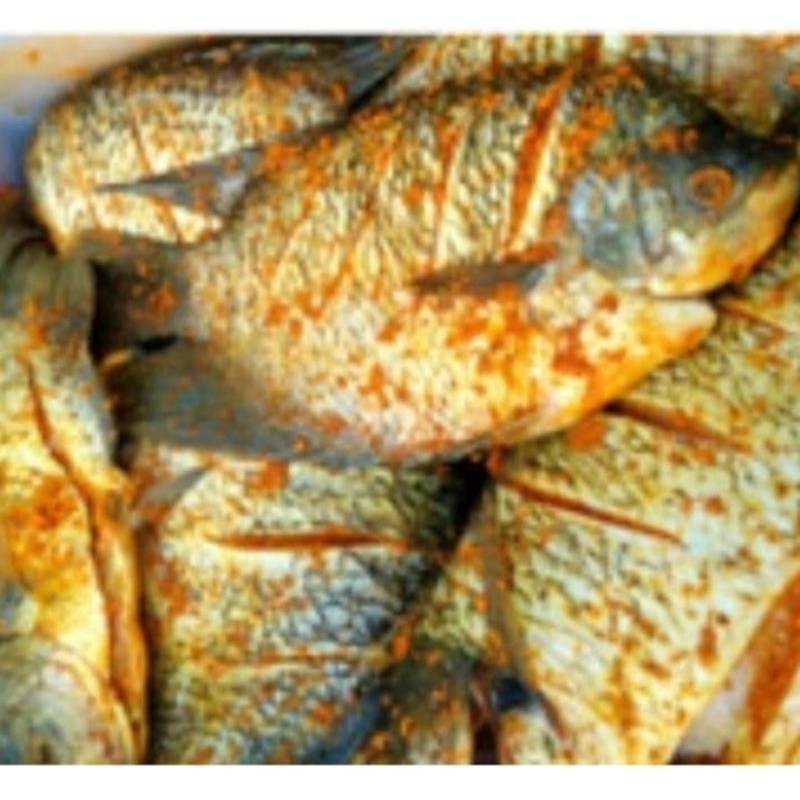 

ikan Mujaer bumbu kuning Siap Goreng. 270 gram. isi 2 ekor