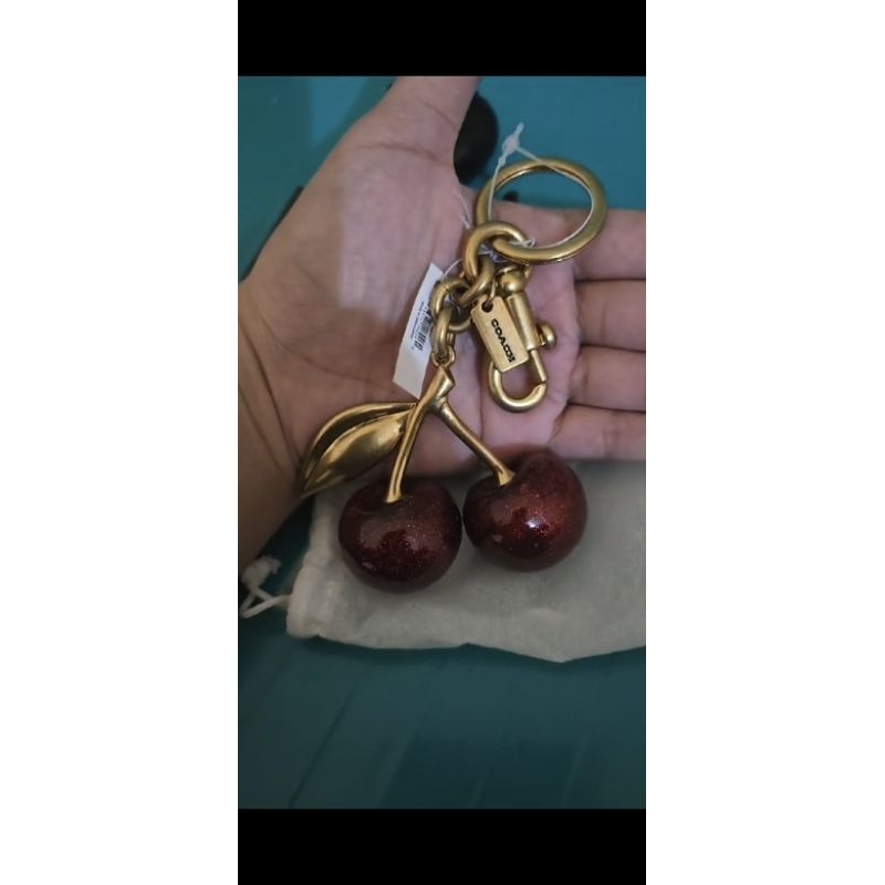bag charm cherry coach