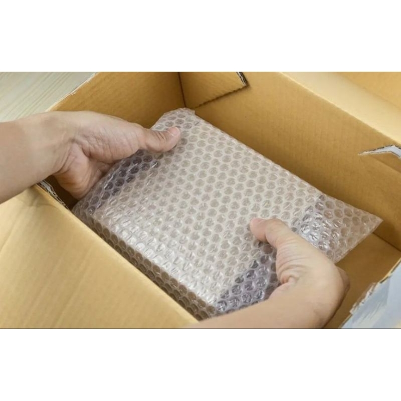 

Extra Packing Bubble Wrap + Kardus
